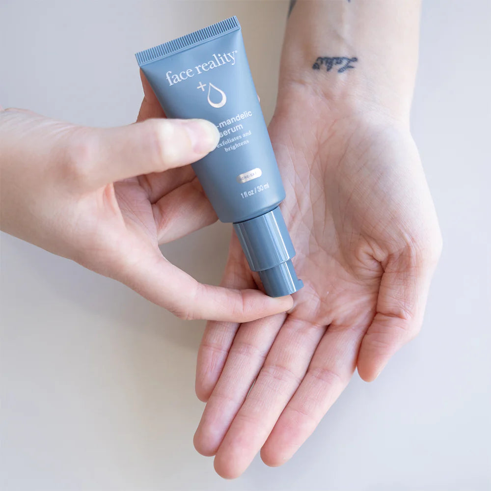 hand holding Face Reality 11% Mandelic Serum