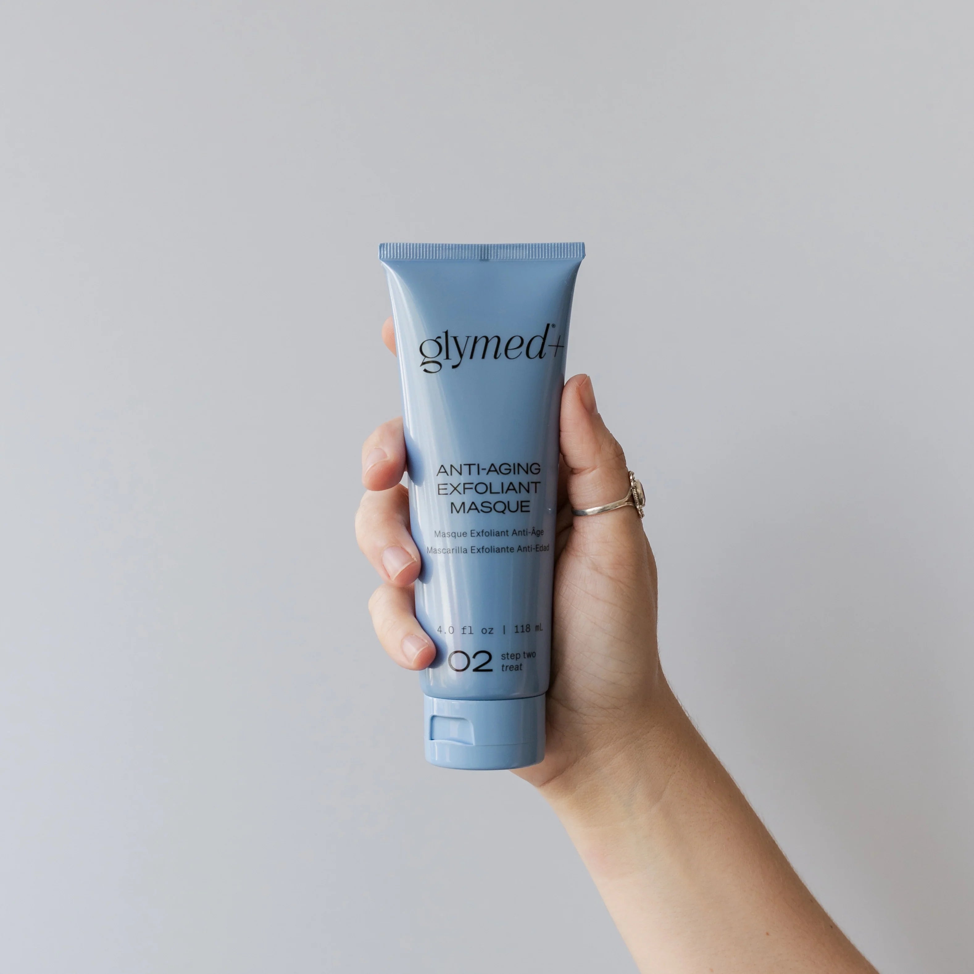 hand holding Glymed+ Anti-Aging Exfoliant Masque