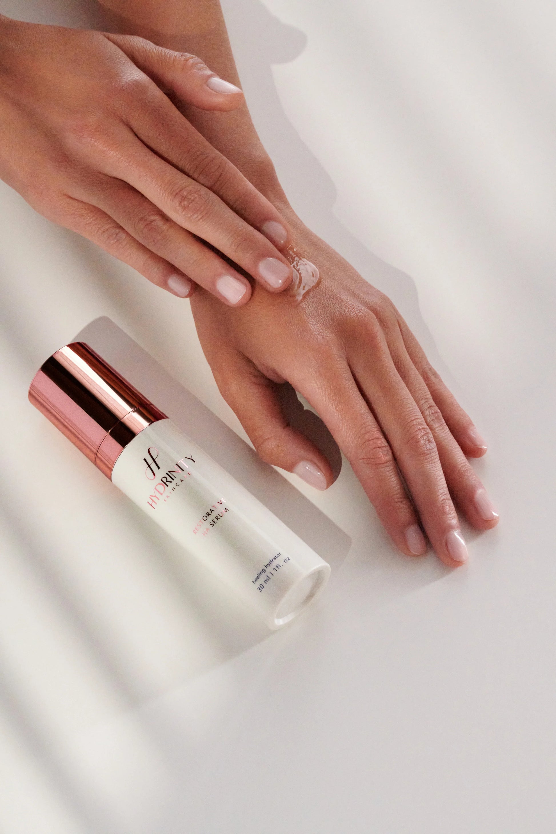 Serum with hand and cream