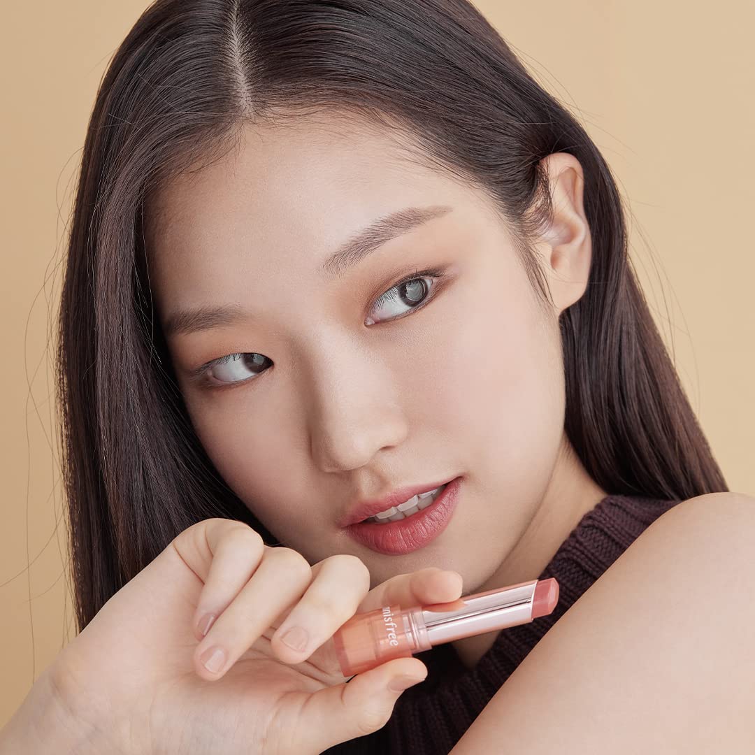 Woman Holding Innisfree Dewy Tint Lip Balm